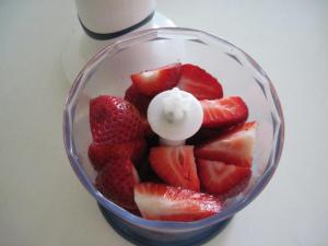 Place strawberries in blender