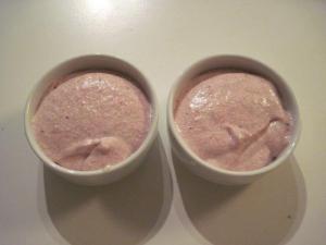Spoon strawberry mousse into bowls