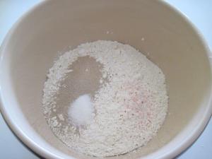 Place flour, salt, sugar and yeast in a bowl