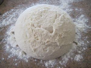 Turn out risen dough