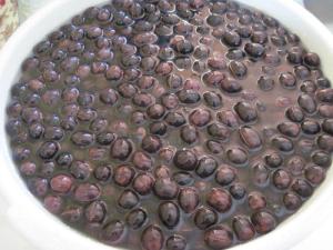 Add brine to olives